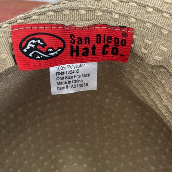 Never worn sun hat; olive/tan color with side straps. - Picture 2 of 3